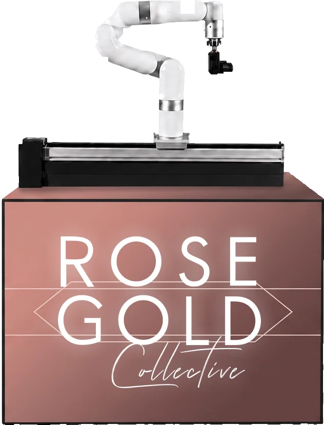 Robotic camera arm mounted on a rail atop a branded base cabinet, shown in a Rose Gold Collective  custom wrap